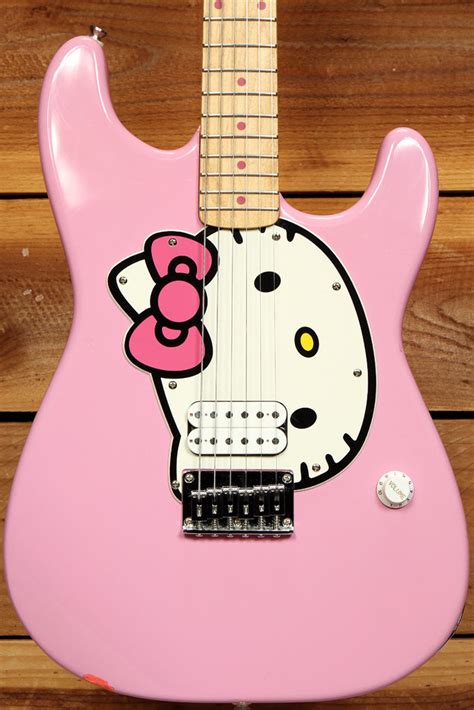 Hello kitty strat - The smiling, friendly face of Hello Kitty herself forms the custom pickguard for Squier's super-cool Hello Kitty Stratocaster guitars. Features include an agathis body, C-shaped maple neck with 21-fret maple fingerboard, single humbucking bridge pickup, chrome hardware, single volume control, dot position inlays, Hello Kitty logo on back of ...